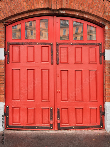 Red wooden gates of vintage...