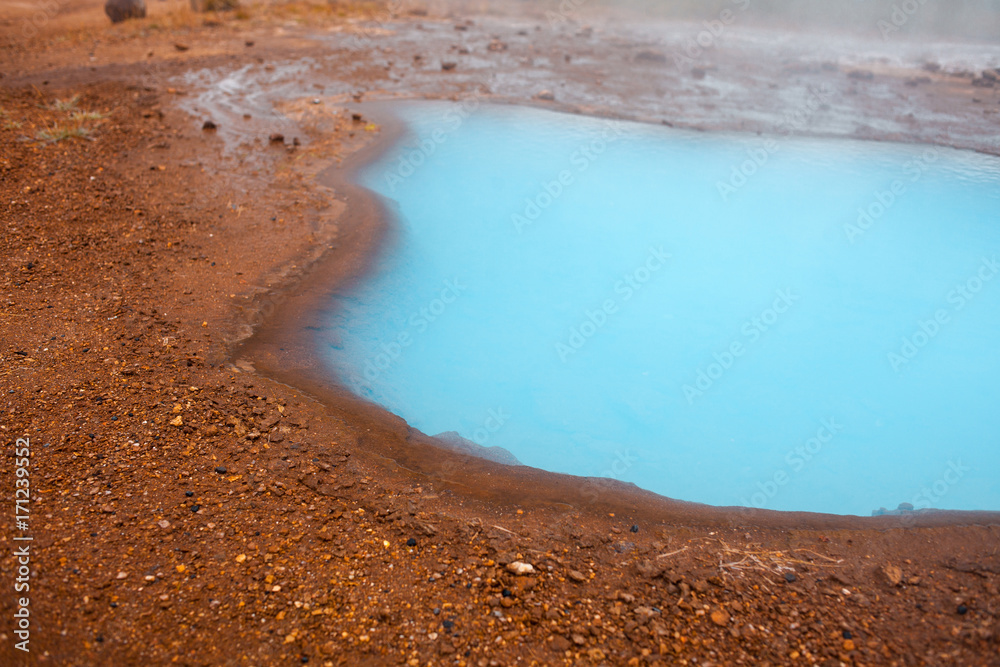 Iceland, valley of geysers, springs of hot geothermal water Iceland, valley of geysers, springs of hot geothermal water