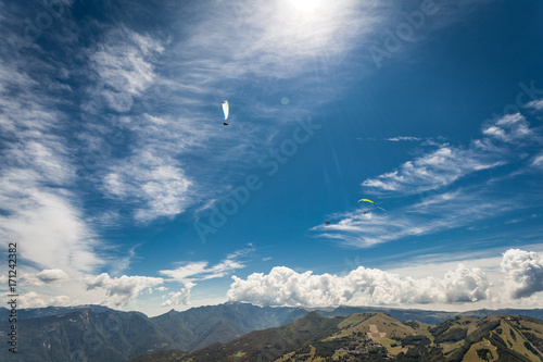 Paragliding in the sky over the dolomites