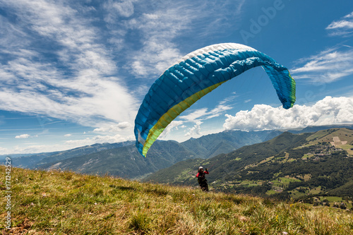 Paragliding in the sky over the dolomites