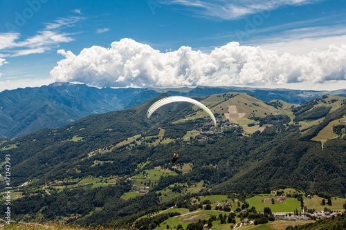 Paragliding in the sky over the dolomites