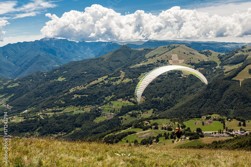 Paragliding in the sky over the dolomites