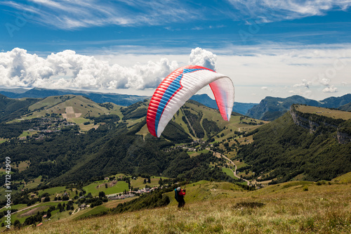 Paragliding in the sky over the dolomites