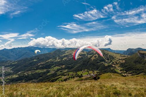 Paragliding in the sky over the dolomites