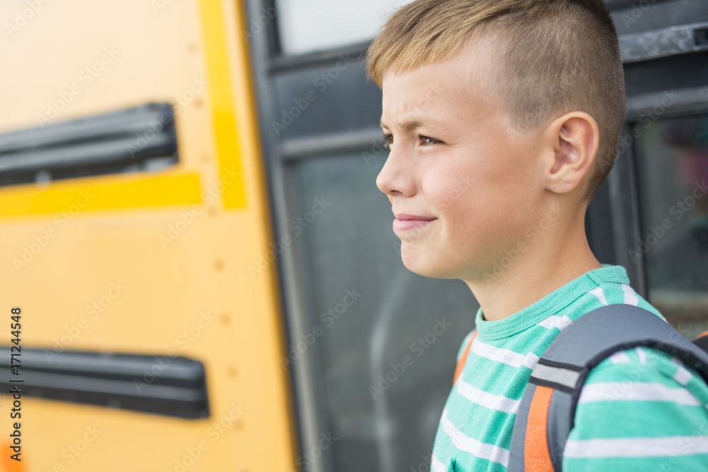 Pre teen boy outside at school Pre teen boy outside at school