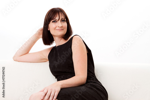 Fashionable beautiful young woman in black.