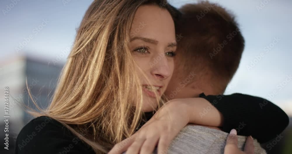 Beautiful young woman embracing tenderly boyfriend Beautiful young woman embracing tenderly boyfriend