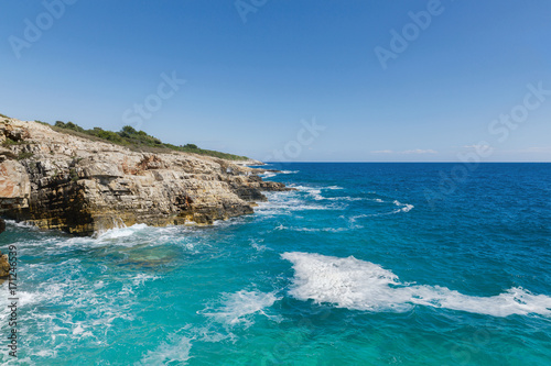 Rocky shore of the Adriatic sea after storm