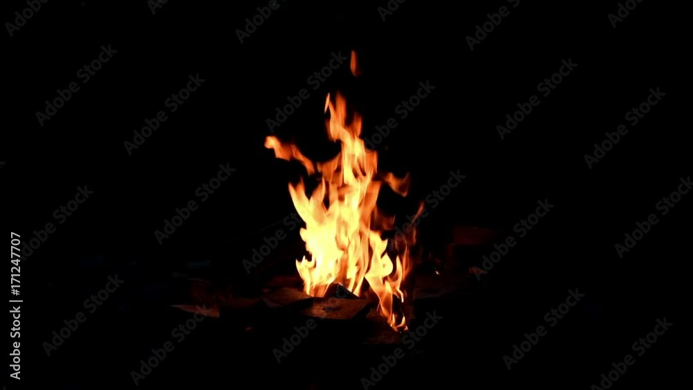 Campfire in dark evening