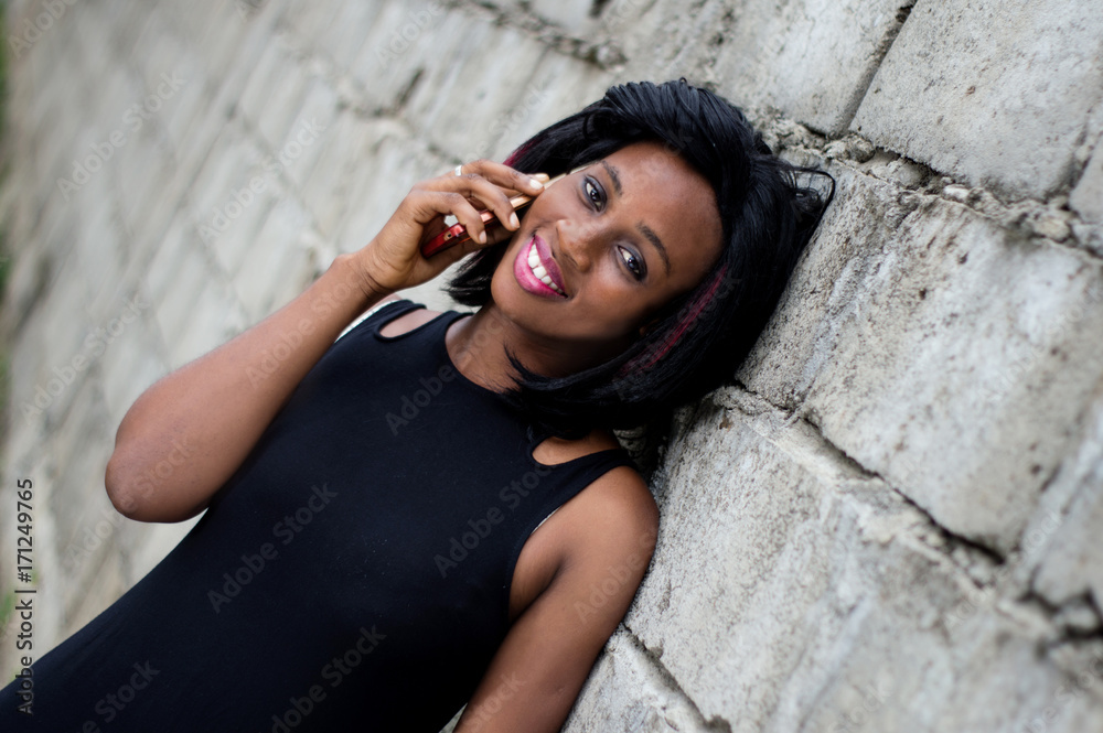 Happy girl talking on the phone