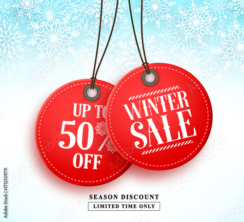 Winter sale vector banner with two red sale tag hanging in white snow background for seasonal marketing promotion. Vector illustration.
