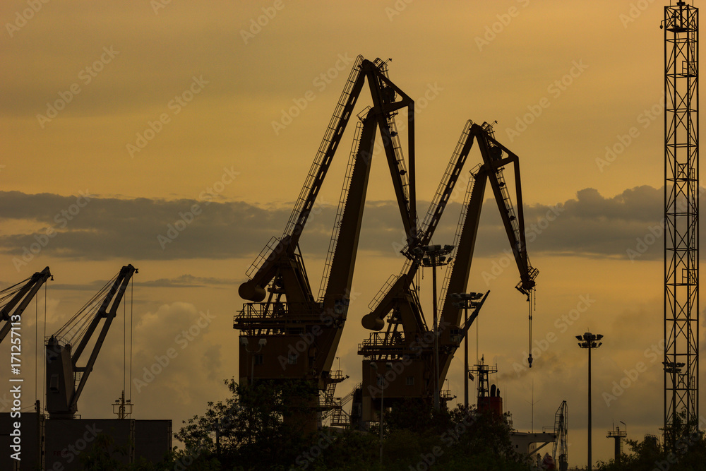 construction crane silhouette sunset sky
