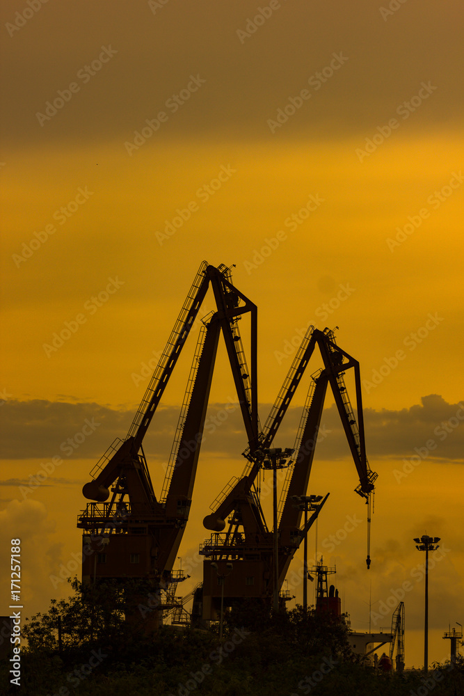 construction crane silhouette sunset sky
