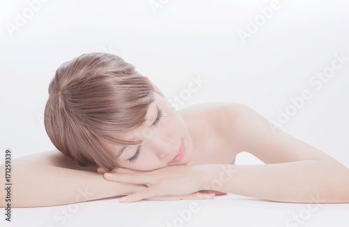 Young asia teen woman sleeping on the desk