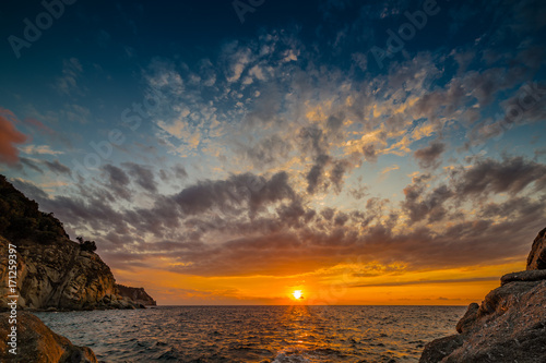 Scenic coastal sunset on island of Elba in Tuscany