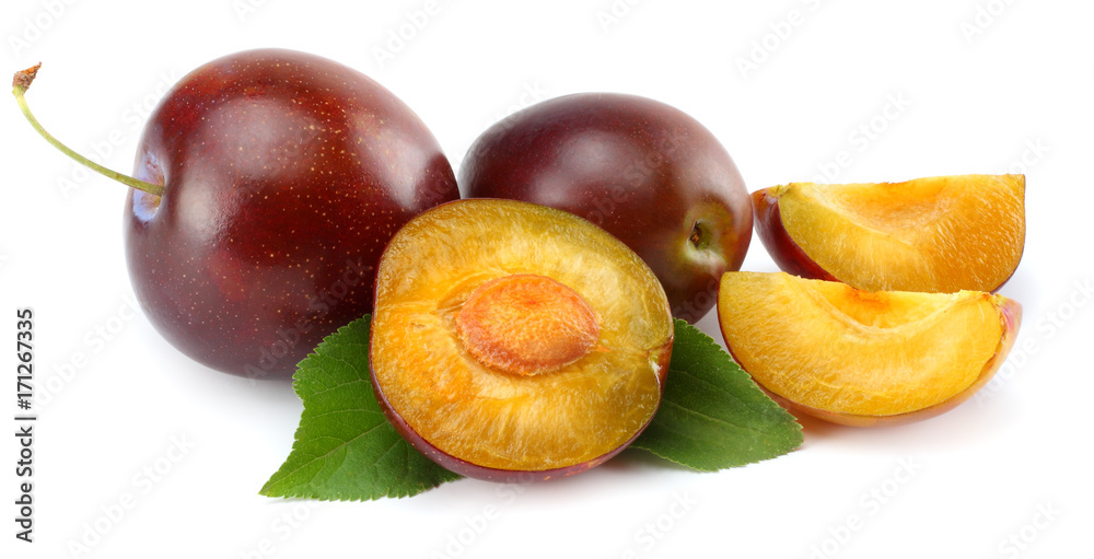 fresh plum fruit with cut plum slices isolated on white background
