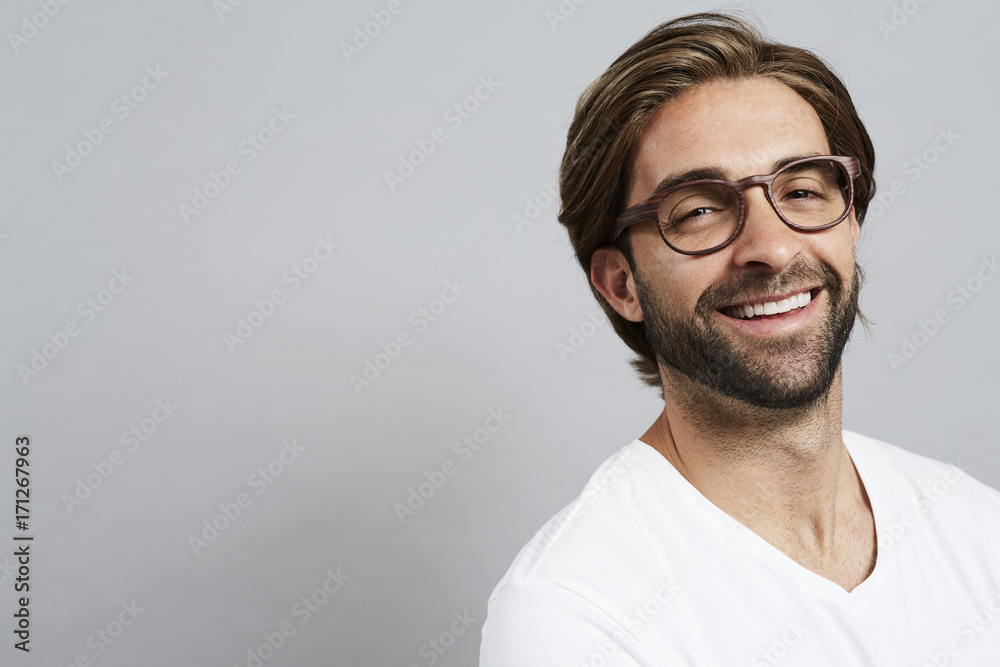 Happy beard guy in studio, smiling Happy beard guy in studio, smiling