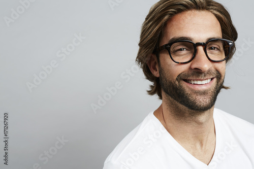 Fototapeta Naklejka Na Ścianę i Meble -  Handsome long hair and beard guy, smiling