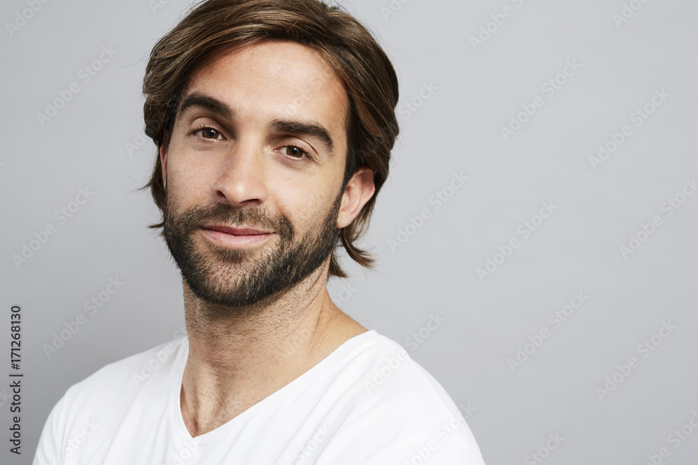Bearded guy in grey studio, portrait Bearded guy in grey studio, portrait