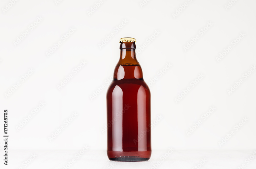 Brown steinie belgian beer bottle 330ml mock up. Template for advertising, design, branding identity on white wood table. Brown steinie belgian beer bottle 330ml mock up. Template for advertising, design, branding identity on white wood table.