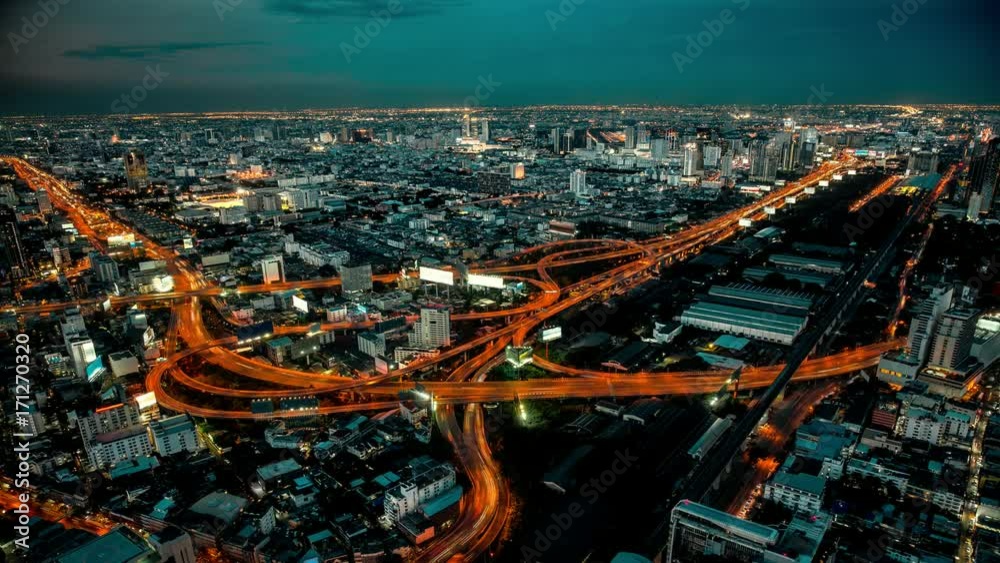 Cinemagraph 4K resolution, Cityscape Bangkok downtown at night, from the top of view on skyscraper, show lighting on the road of communication concept. Abstract background with HRD effect filter.