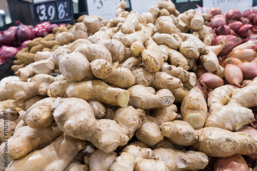 Pile of fresh ginger root. Pile of fresh ginger root.