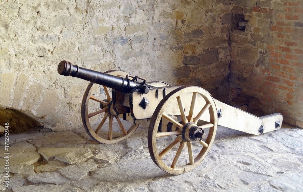 Old cannon - powerful weapon of medieval army.