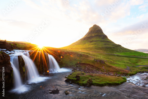 Colorful sunrise on Kirkjufellsfoss waterfall