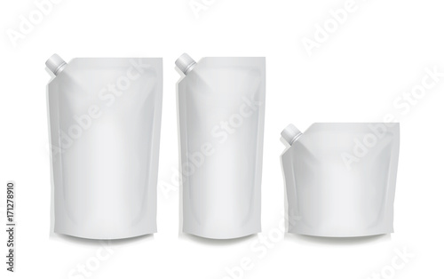Three foil food or drink pouch bags on white background