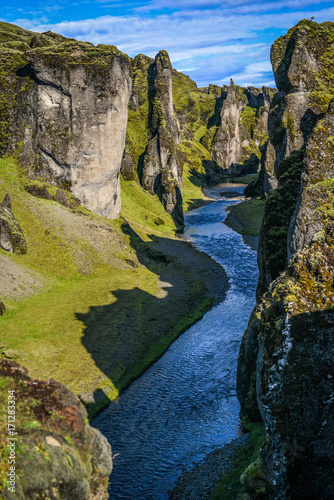 Fjaorargljufur canyon in south Iceland, picturesque mountains and stream.