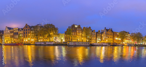 Amsterdam sunset panorama city skyline at canal waterfront  Amsterdam  Netherlands