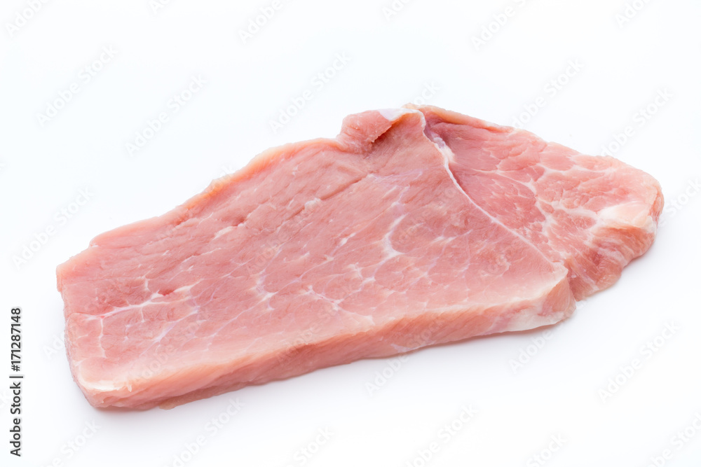 Fresh pork fillet with basil on a white background. Fresh pork fillet with basil on a white background.