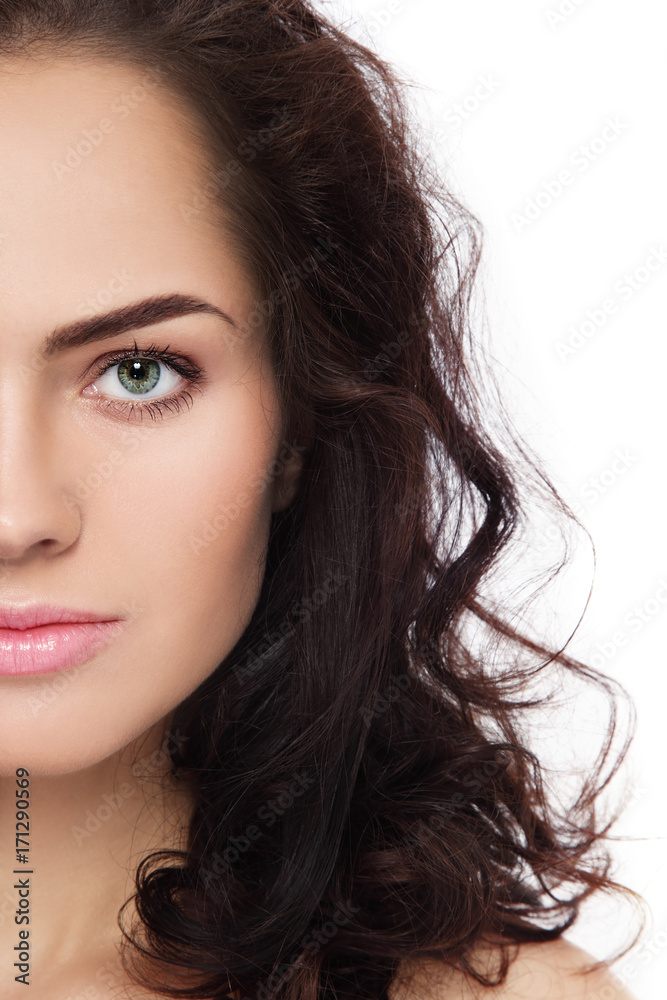 Close-up portrait of young beautiful woman with fresh clean make-up and curly hair over white background, copy space Close-up portrait of young beautiful woman with fresh clean make-up and curly hair over white background, copy space