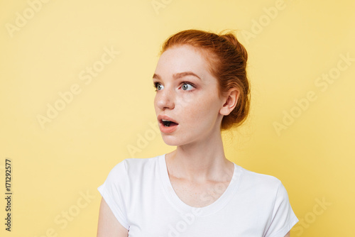 Shocked ginger girl looking away © Drobot Dean