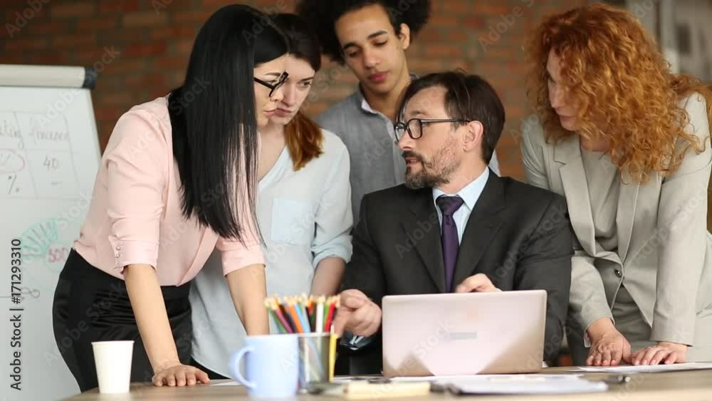 Unsatisfied employees in directors office. Close up view of business team arguing with chief. Unsatisfied employees in directors office. Close up view of business team arguing with chief.