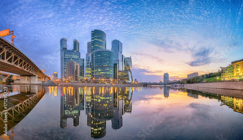 Photography Cityscape of Moscow city business district reflecting in Moskva river in the mor