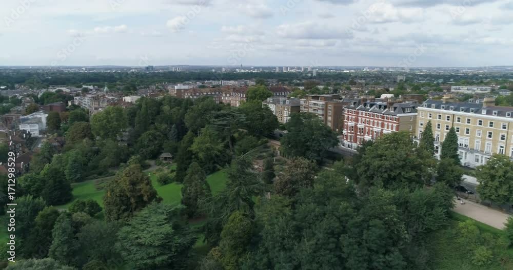 Aerial panning view over residential Victorian villages by the river Thames in West London Aerial panning view over residential Victorian villages by the river Thames in West London