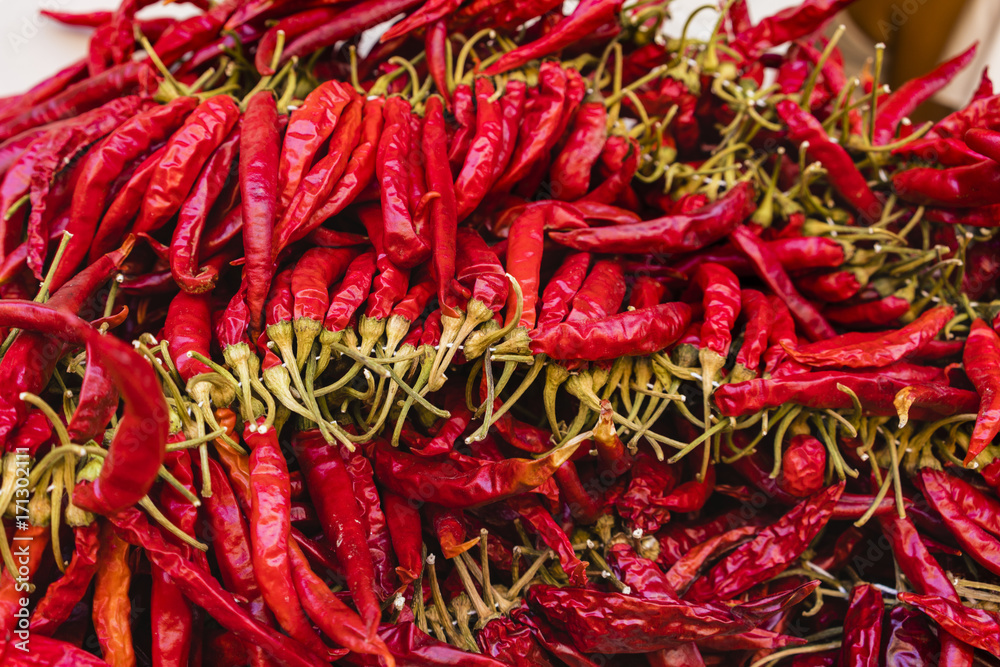 a bunch of hot red peppers