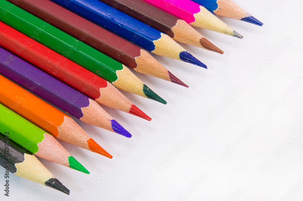 Color pencils in rainbow on white background Color pencils in rainbow on white background