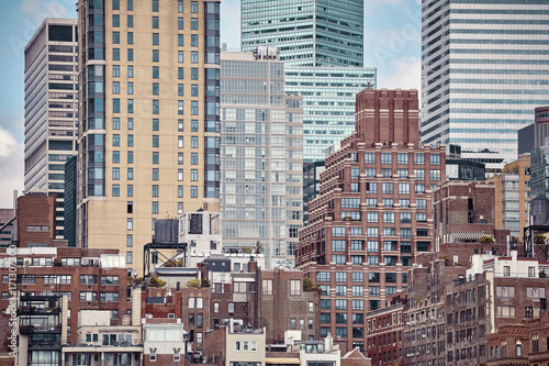 Varied architecture of Manhattan, color toning applied, New York City, USA.