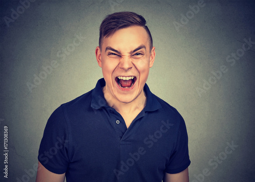 portrait of young angry man screaming © Feodora