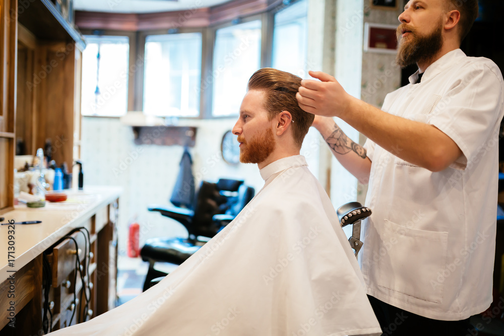 Fototapeta premium Male receiving hair beard treatment