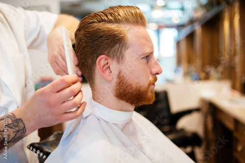Male receiving hair beard treatment