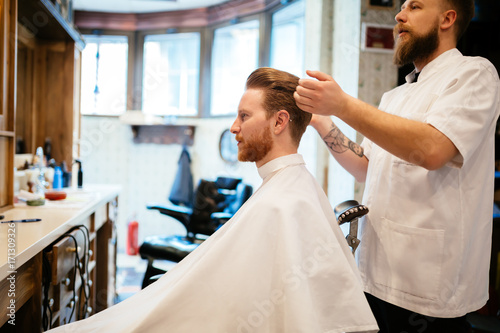 Male receiving hair beard treatment