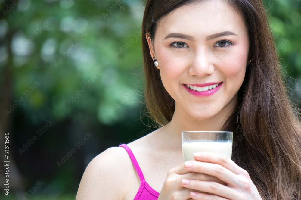 Asian healthy woman drink milk in morning breakfast for health Asian healthy woman drink milk in morning breakfast for health
