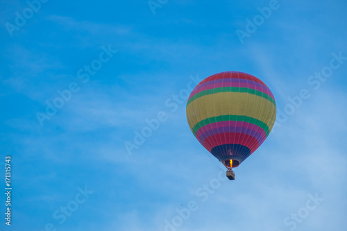 The balloon on the blue sky morning. subject is blurred. © Wuttichai