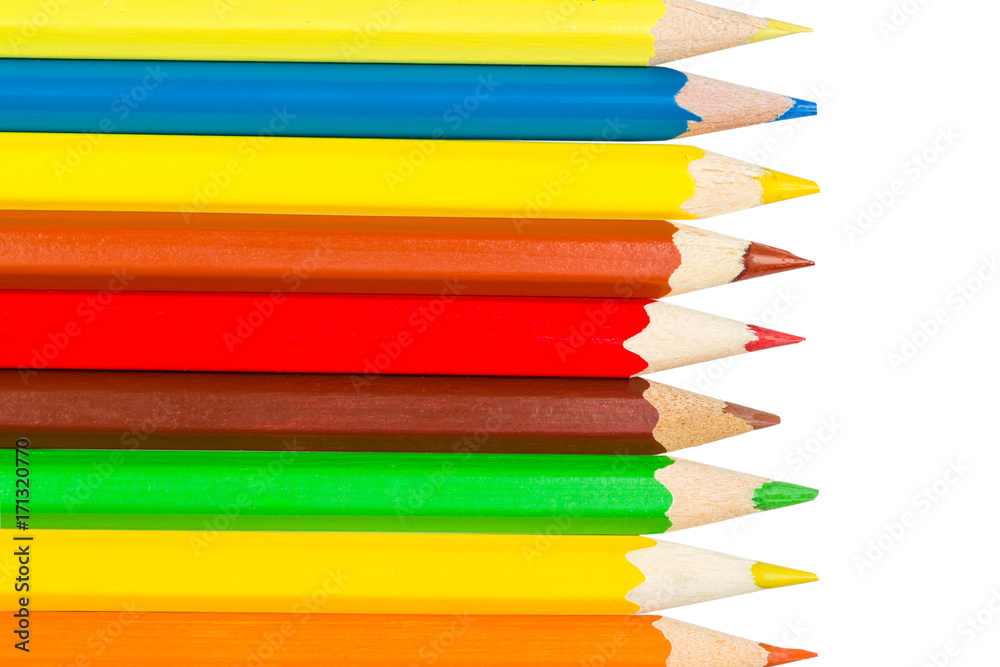 Colored pencils in a row on the left Colored pencils in a row on the left