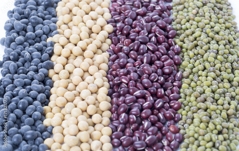 Different colorful beans close up, soybeans, black beans, mung beans,red beans.
Different colorful beans close up, soybeans, black beans, mung beans,red beans.
