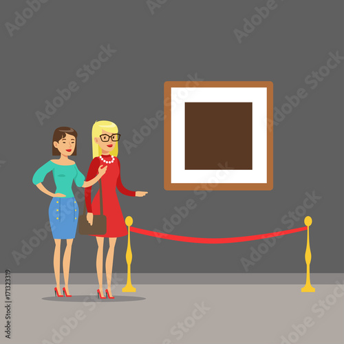 Two young women standing in modern art gallery looking at the painting hanging on the wall, people attending museum