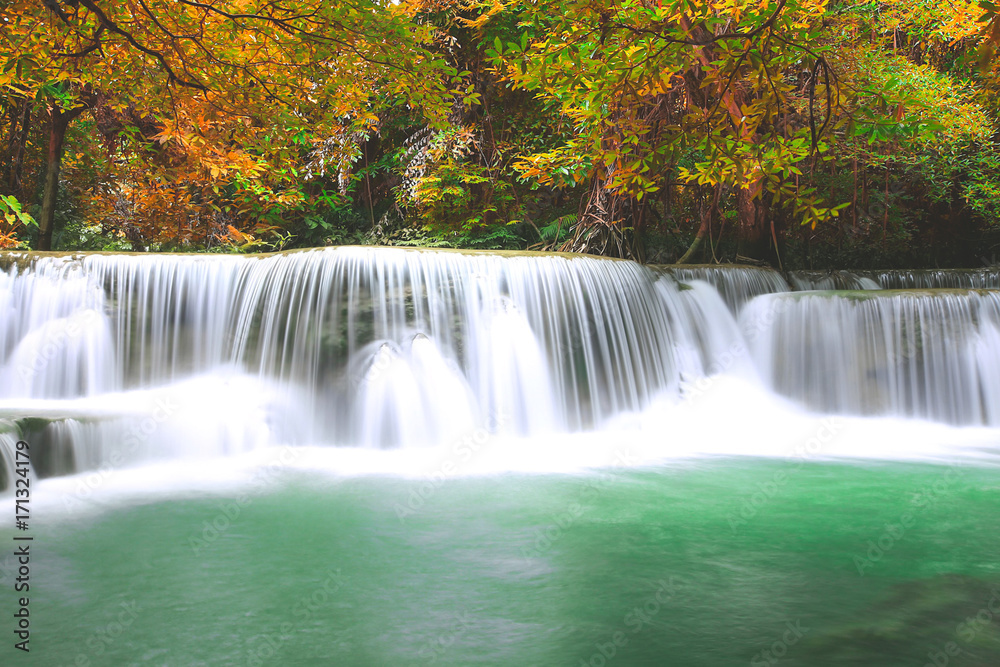 Huay Mae Kamin Waterfall, beautiful waterfall in autumn forest, Kanchanaburi province, Thailand